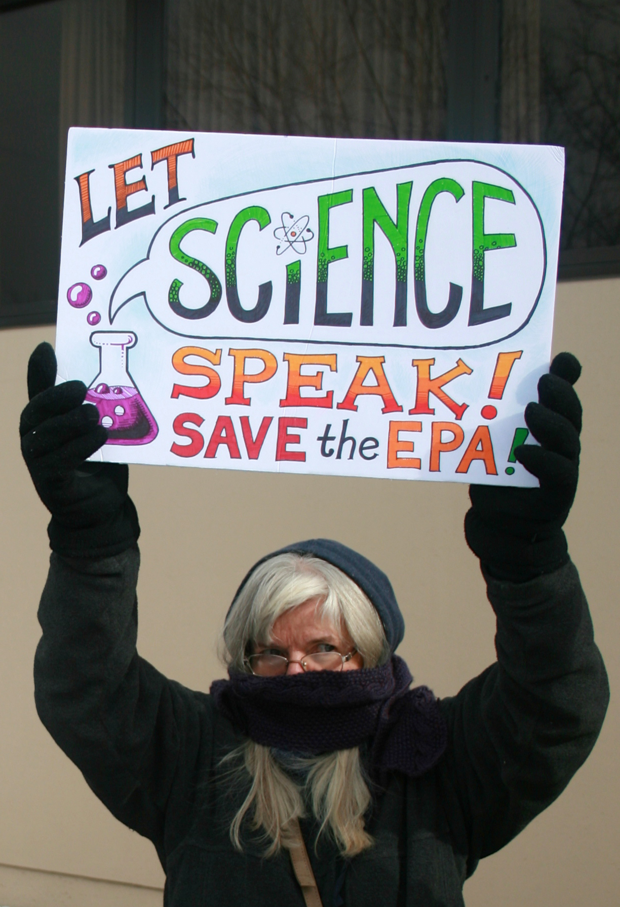 Protester carrying "Let Science Speak/Save the EPA" Sign